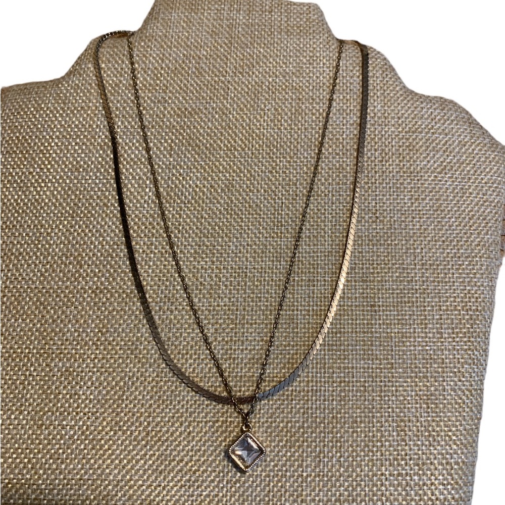 Cute little gold tone Express double necklace.